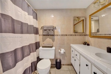 This charming 2-bedroom, 2-bathroom condo offers the perfect on Pine Island Ridge Country Club in Florida - for sale on GolfHomes.com, golf home, golf lot