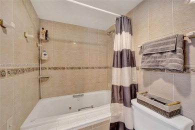 This charming 2-bedroom, 2-bathroom condo offers the perfect on Pine Island Ridge Country Club in Florida - for sale on GolfHomes.com, golf home, golf lot