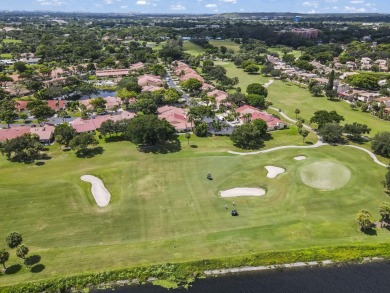 Experience  Florida lifestyle in this beautifully maintained on Deer Creek Golf Club in Florida - for sale on GolfHomes.com, golf home, golf lot