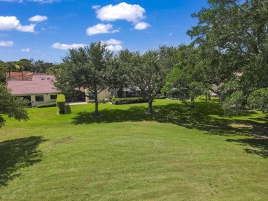 Experience  Florida lifestyle in this beautifully maintained on Deer Creek Golf Club in Florida - for sale on GolfHomes.com, golf home, golf lot