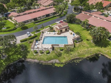 Experience  Florida lifestyle in this beautifully maintained on Deer Creek Golf Club in Florida - for sale on GolfHomes.com, golf home, golf lot