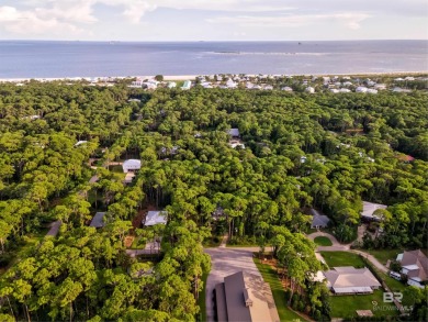 Fall in love with this cozy three bedroom, two bath home tucked on Isle Dauphine Club Golf Course in Alabama - for sale on GolfHomes.com, golf home, golf lot