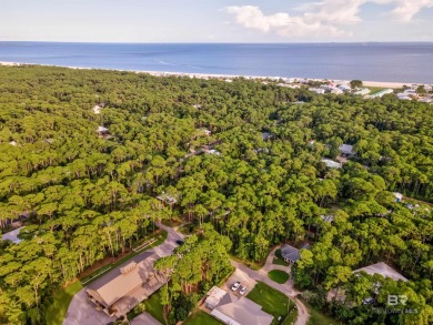 Fall in love with this cozy three bedroom, two bath home tucked on Isle Dauphine Club Golf Course in Alabama - for sale on GolfHomes.com, golf home, golf lot