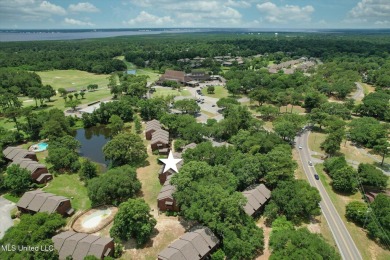 Furnished ready for a new occupant - upper level efficiency on Diamondhead Country Club in Mississippi - for sale on GolfHomes.com, golf home, golf lot