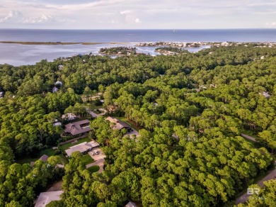 Fall in love with this cozy three bedroom, two bath home tucked on Isle Dauphine Club Golf Course in Alabama - for sale on GolfHomes.com, golf home, golf lot