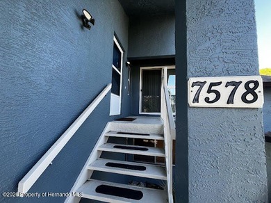 Don't miss this Beautiful 2nd floor condo overlooking the on Heather Golf and Country Club in Florida - for sale on GolfHomes.com, golf home, golf lot