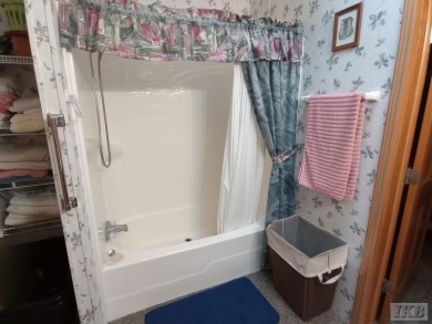 Discover this affordable 3-bedroom gem in the heart of Sugar on Lakeside Golf Course in Michigan - for sale on GolfHomes.com, golf home, golf lot