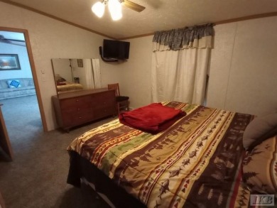 Discover this affordable 3-bedroom gem in the heart of Sugar on Lakeside Golf Course in Michigan - for sale on GolfHomes.com, golf home, golf lot
