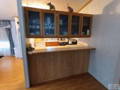Discover this affordable 3-bedroom gem in the heart of Sugar on Lakeside Golf Course in Michigan - for sale on GolfHomes.com, golf home, golf lot