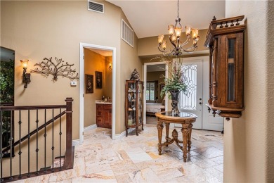 Listing courtesy of Lori Robinson, Coldwell Banker ABR on Canyon Lake Country Club in California - for sale on GolfHomes.com, golf home, golf lot