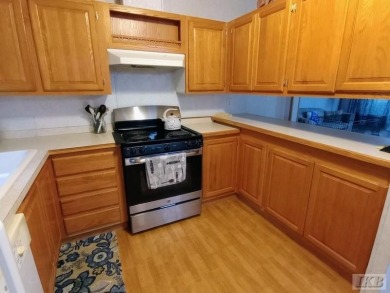Discover this affordable 3-bedroom gem in the heart of Sugar on Lakeside Golf Course in Michigan - for sale on GolfHomes.com, golf home, golf lot