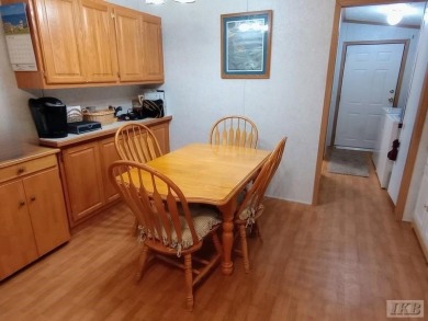 Discover this affordable 3-bedroom gem in the heart of Sugar on Lakeside Golf Course in Michigan - for sale on GolfHomes.com, golf home, golf lot
