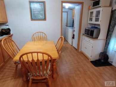 Discover this affordable 3-bedroom gem in the heart of Sugar on Lakeside Golf Course in Michigan - for sale on GolfHomes.com, golf home, golf lot