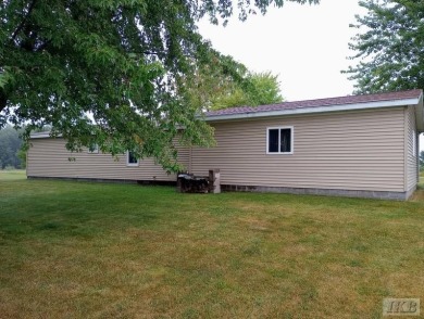 Discover this affordable 3-bedroom gem in the heart of Sugar on Lakeside Golf Course in Michigan - for sale on GolfHomes.com, golf home, golf lot