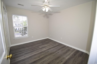 Enter the gated, secure private community of your newly on Wachesaw Plantation East Golf Course in South Carolina - for sale on GolfHomes.com, golf home, golf lot