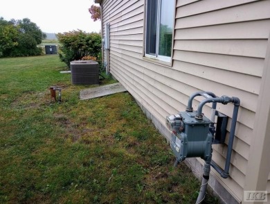 Discover this affordable 3-bedroom gem in the heart of Sugar on Lakeside Golf Course in Michigan - for sale on GolfHomes.com, golf home, golf lot
