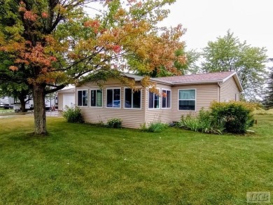 Discover this affordable 3-bedroom gem in the heart of Sugar on Lakeside Golf Course in Michigan - for sale on GolfHomes.com, golf home, golf lot