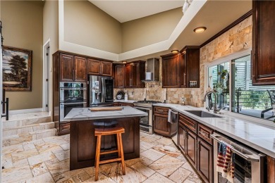 Listing courtesy of Lori Robinson, Coldwell Banker ABR on Canyon Lake Country Club in California - for sale on GolfHomes.com, golf home, golf lot