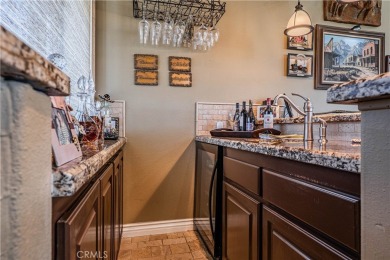 Listing courtesy of Lori Robinson, Coldwell Banker ABR on Canyon Lake Country Club in California - for sale on GolfHomes.com, golf home, golf lot