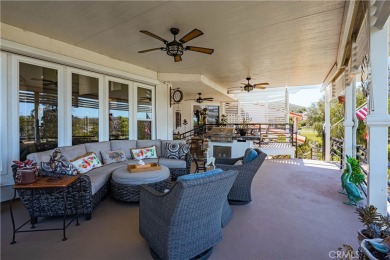 Listing courtesy of Lori Robinson, Coldwell Banker ABR on Canyon Lake Country Club in California - for sale on GolfHomes.com, golf home, golf lot