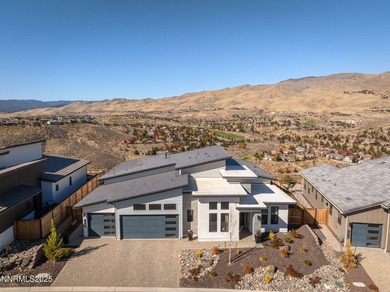 Welcome to this contemporary Somersett home located in the gated on Somersett Country Club in Nevada - for sale on GolfHomes.com, golf home, golf lot