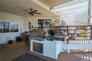 Listing courtesy of Lori Robinson, Coldwell Banker ABR on Canyon Lake Country Club in California - for sale on GolfHomes.com, golf home, golf lot