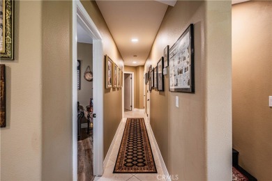 Listing courtesy of Lori Robinson, Coldwell Banker ABR on Canyon Lake Country Club in California - for sale on GolfHomes.com, golf home, golf lot