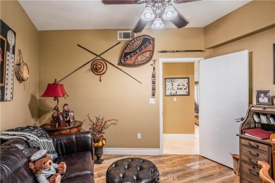 Listing courtesy of Lori Robinson, Coldwell Banker ABR on Canyon Lake Country Club in California - for sale on GolfHomes.com, golf home, golf lot