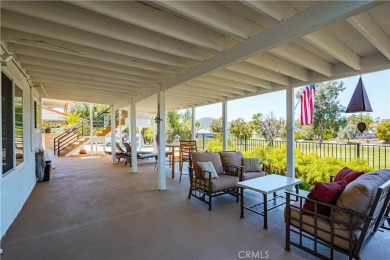 Listing courtesy of Lori Robinson, Coldwell Banker ABR on Canyon Lake Country Club in California - for sale on GolfHomes.com, golf home, golf lot