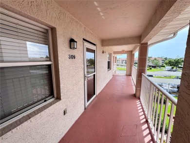 Enjoy Golfing and Florida living in this top floor 2 bedroom 2 on Tara Golf and Country Club in Florida - for sale on GolfHomes.com, golf home, golf lot