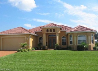 Welcome to the perfect home in Cape Coral's Golfing community on Royal Tee Country Club in Florida - for sale on GolfHomes.com, golf home, golf lot