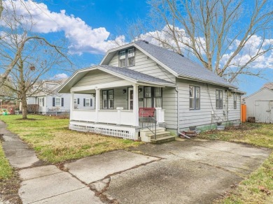 Cute Bungalow with original hardwood floors & full basement on Monticello Golf Course in Illinois - for sale on GolfHomes.com, golf home, golf lot