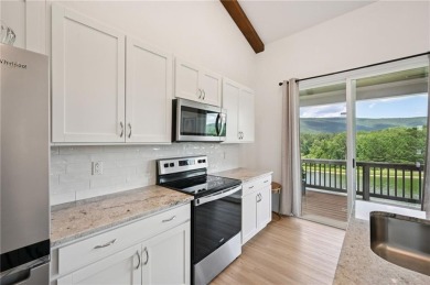 COME GET THIS AMAZING GOLF COURSE COTTAGE WITH SPECTACULAR VIEWS on The Highlands Course at Lake Arrowhead in Georgia - for sale on GolfHomes.com, golf home, golf lot