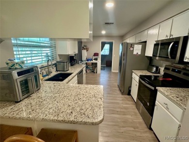 Nestled on a spacious, lush lot in the heart of Beverly Hills' on Brentwood Farms Golf Club in Florida - for sale on GolfHomes.com, golf home, golf lot