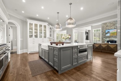 A rare offering - golf course frontage plus $600K+ in luxury on Manor Golf and Country Club in Georgia - for sale on GolfHomes.com, golf home, golf lot