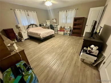 Nestled on a spacious, lush lot in the heart of Beverly Hills' on Brentwood Farms Golf Club in Florida - for sale on GolfHomes.com, golf home, golf lot
