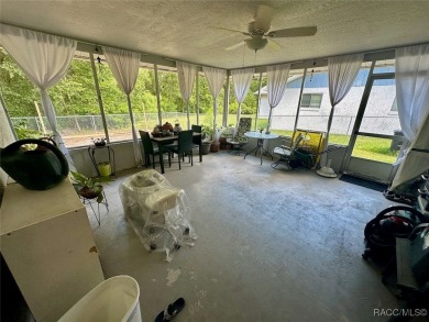 Nestled on a spacious, lush lot in the heart of Beverly Hills' on Brentwood Farms Golf Club in Florida - for sale on GolfHomes.com, golf home, golf lot