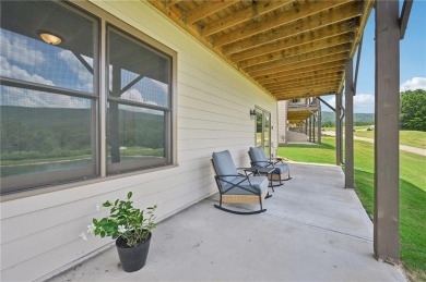 COME GET THIS AMAZING GOLF COURSE COTTAGE WITH SPECTACULAR VIEWS on The Highlands Course at Lake Arrowhead in Georgia - for sale on GolfHomes.com, golf home, golf lot