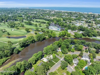 Luxury meets tranquility in this captivating waterfront property on Deal Golf and Country Club in New Jersey - for sale on GolfHomes.com, golf home, golf lot