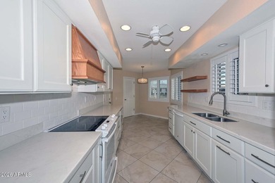 Enjoy breathtaking views and modern updates in this beautifully on Sun City Riverview Golf Course in Arizona - for sale on GolfHomes.com, golf home, golf lot