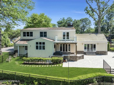 Luxury meets tranquility in this captivating waterfront property on Deal Golf and Country Club in New Jersey - for sale on GolfHomes.com, golf home, golf lot