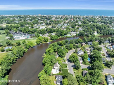 Luxury meets tranquility in this captivating waterfront property on Deal Golf and Country Club in New Jersey - for sale on GolfHomes.com, golf home, golf lot