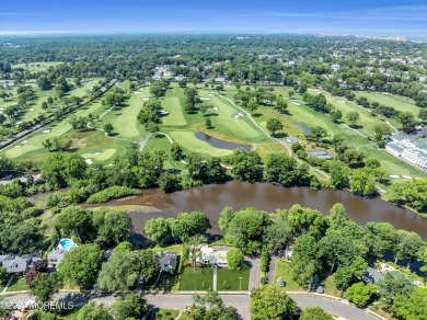 Luxury meets tranquility in this captivating waterfront property on Deal Golf and Country Club in New Jersey - for sale on GolfHomes.com, golf home, golf lot