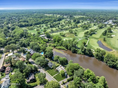 Luxury meets tranquility in this captivating waterfront property on Deal Golf and Country Club in New Jersey - for sale on GolfHomes.com, golf home, golf lot