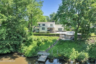 Luxury meets tranquility in this captivating waterfront property on Deal Golf and Country Club in New Jersey - for sale on GolfHomes.com, golf home, golf lot