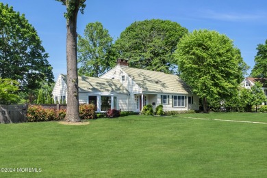 Luxury meets tranquility in this captivating waterfront property on Deal Golf and Country Club in New Jersey - for sale on GolfHomes.com, golf home, golf lot