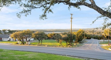 Relax and enjoy the lake and hill country views from the family on Highland Lakes Golf Course in Texas - for sale on GolfHomes.com, golf home, golf lot