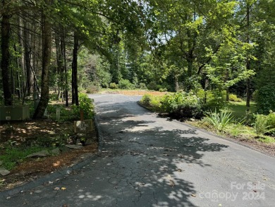 Experience relaxed luxury living in Flat Rock's premier on Kenmure Country Club in North Carolina - for sale on GolfHomes.com, golf home, golf lot