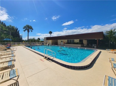 Beautiful condo with long views of the golf course from the on The American Golf Club in Florida - for sale on GolfHomes.com, golf home, golf lot