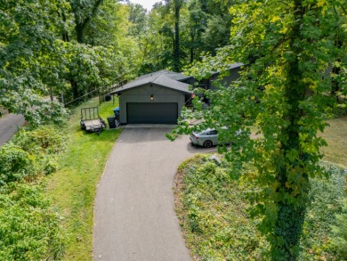Enjoy lake living in the sought-after Lake Doster community on Lake Doster Golf Club in Michigan - for sale on GolfHomes.com, golf home, golf lot